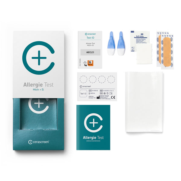 Inhalt des Milch- und Ei- Allergietestkits von cerascreen: Verpackung, Anleitung, Lanzetten, Plfaster, Trockenblutschatulle, Desinfektionstuch, Rücksendeumschlag